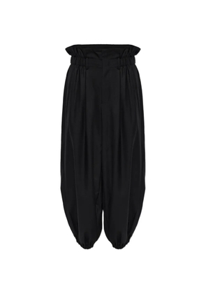 Noir Kei Ninomiya elasticated-cuff wool trousers - Black