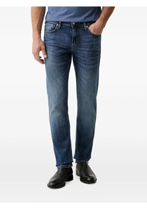 GUESS USA faded whiskered jeans - Blue