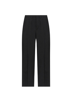 Maison Margiela pressed-crease wool trousers - Black