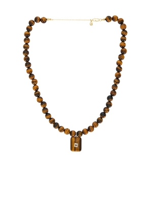 SHASHI Gemstone Tiger Eye Pendant Necklace in Brown.