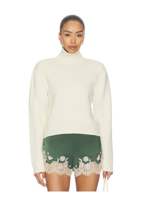 Rohe Statement Shoulder Cropped Turtleneck Sweater in Cream. Size 34. Also in 32, 36, 38.
