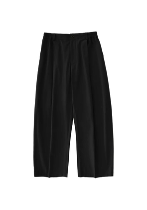 Studio Nicholson Shire pleated cotton trousers - Black