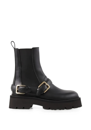 SANDRO buckled glossed-leather Chelsea boots - Black