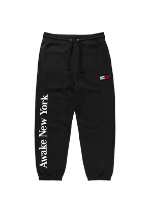 Awake NY x Tommy Hilfiger logo-print loose-fit pants - Black