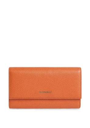 Coccinelle large Metallic leather wallet - Orange