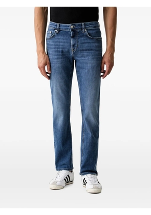 Joop! faded-effect logo-patch jeans - Blue