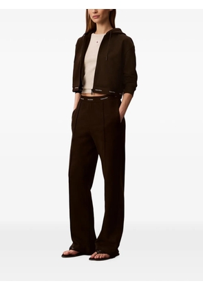 Calvin Klein logo-waistband pintuck-detail track pants - Brown