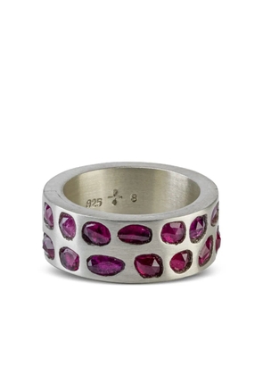 Parts of Four sterling silver Sistema ruby ring