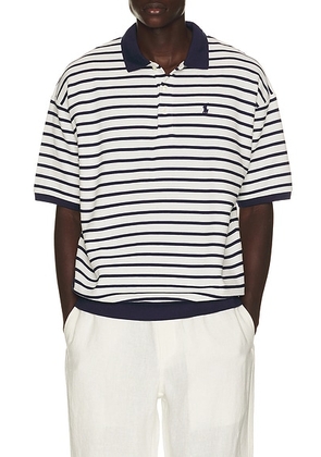 Polo Ralph Lauren Short Sleeve Yarn Dyed Jacquard Textured Interlock Striped Polo in Nevis & Newport Navy - Navy. Size M (also in S, L, XXL/2X).