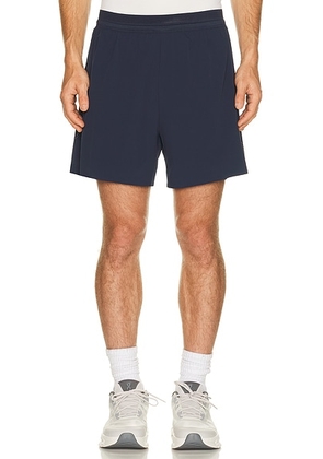 On 5 Performance Shorts in Midnight - Blue. Size XS (also in L, XL/1X, S, M, XXL/2X).