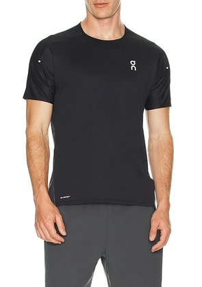 On Performance-T in Black & Eclipse - Black. Size XXL/2X (also in S, M, L, XL/1X, XS).