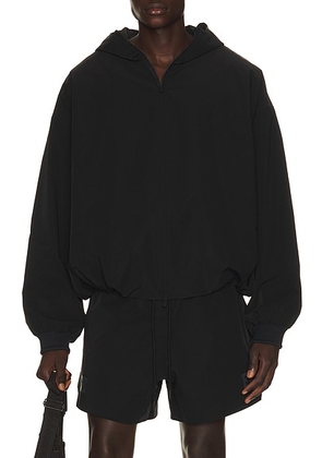 Fear of God ESSENTIALS Full Zip Hooded Anorak in Vintage Black - Black. Size XXL/2X (also in XS, S, M, L, XL/1X, XXXL/3X).