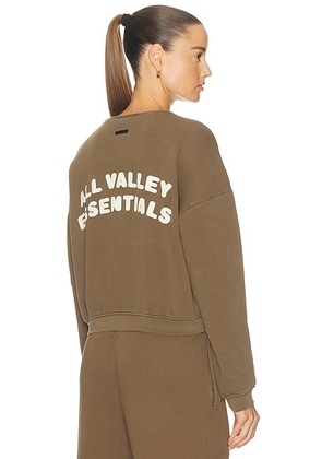 Fear of God ESSENTIALS Half Zip Sweatshirt in Washed Moss - Brown. Size S (also in XS, M, XL).