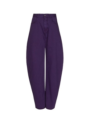 ALAÏA Round Leg in Violet Washed - Purple. Size 36 (also in 34).