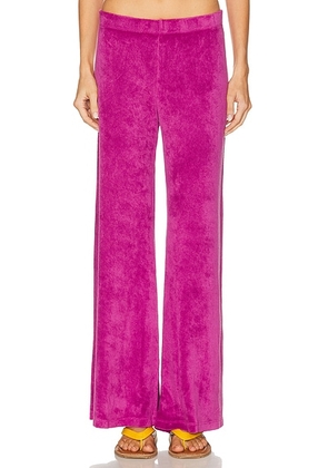 Suzie Kondi Zephyra Flare Pant in Magenta - Fuchsia. Size S (also in XS, M).