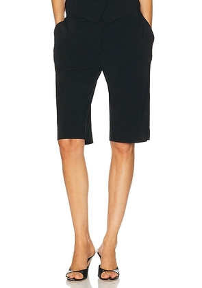 Norma Kamali Flat Front Bermuda Short in Black - Black. Size L (also in S, XS).