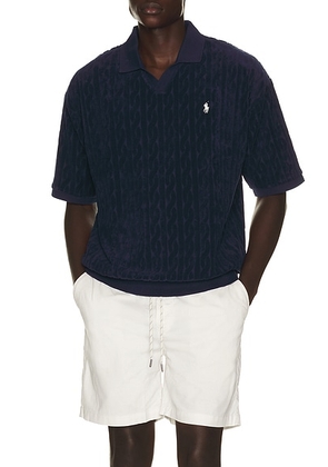 Polo Ralph Lauren Short Sleeve Cable Terry Johnny Collar Polo in Newport Navy - Navy. Size L (also in S, M, XL/1X, XXL/2X).