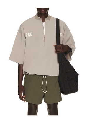 Fear of God ESSENTIALS Half Zip Baseball Shirt in Grey. Size XS. Also in S, M, L, XL/1X, XXL/2X, XXXL/3X.