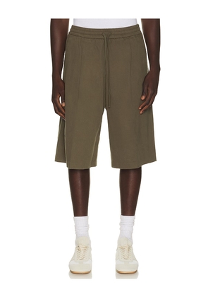 Fear of God ESSENTIALS Relaxed Drawstring Short in Brown. Size XS. Also in S, M, L, XL/1X.