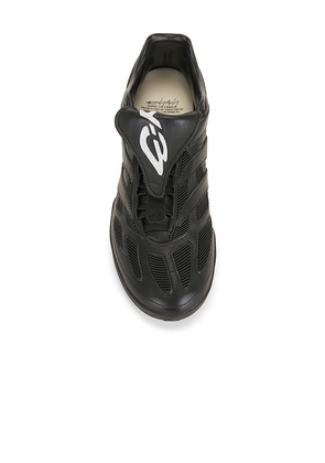 Y-3 Predator Precision Sneaker in Black. Size 8. Also in 8.5, 9, 9.5, 10, 10.5, 11.5, 12.