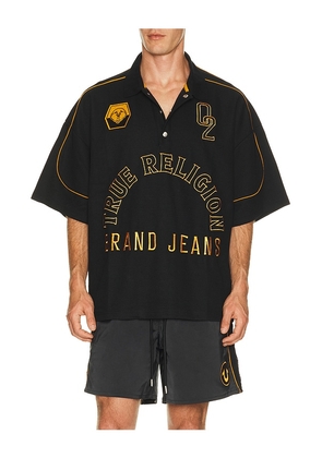 True Religion Multi Logo Oversized Polo in Black. Size S. Also in M, L, XL/1X.
