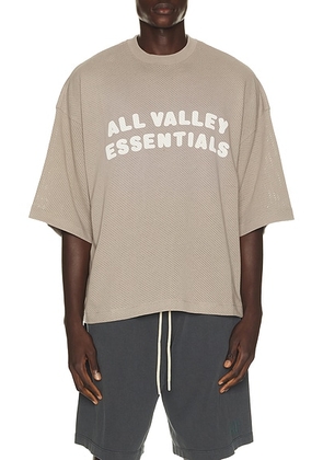 Fear of God ESSENTIALS Merch Tee in Seal - Grey. Size XS (also in S, M, L, XL/1X, XXL/2X, XXXL/3X).