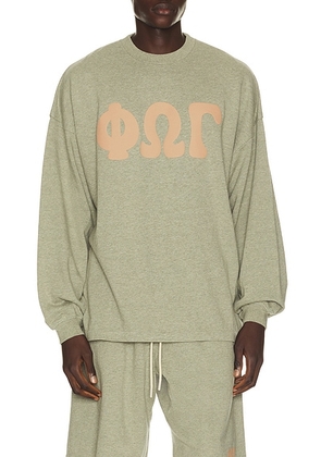 Fear of God ESSENTIALS Merch Long Sleeve Tee in Washed Seal Heather - Grey. Size XL/1X (also in XS, S, M, L, XXL/2X, XXXL/3X).
