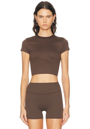 NikeSKIMS Matte Corset Short Sleeve Crop Top in Dark Sepia - Chocolate. Size XS (also in L, M, S, XL).