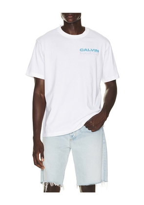 Calvin Klein Disc Stack Graphic Tee in White. Size XS. Also in S, M, L, XL/1X.
