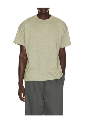 Fear of God ESSENTIALS Tee in Green. Size XS. Also in S, M, L, XL/1X, XXL/2X, XXXL/3X.