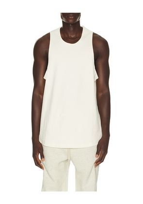 Fear of God ESSENTIALS Ribbed Essential Tank in White. Size XS. Also in S, M, L, XL/1X, XXL/2X, XXXL/3X.