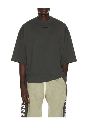 Fear of God ESSENTIALS Merch Tee in Black. Size XS. Also in S, M, L, XL/1X, XXL/2X, XXXL/3X.