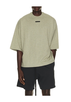 Fear of God ESSENTIALS Merch Tee in Green. Size XS. Also in S, M, L, XL/1X, XXL/2X, XXXL/3X.