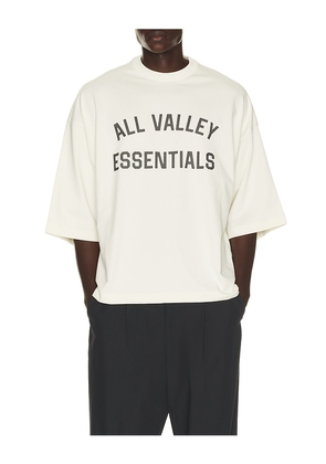 Fear of God ESSENTIALS Merch Tee in White. Size XS. Also in S, M, L, XL/1X, XXL/2X, XXXL/3X.