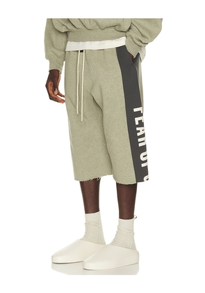 Fear of God ESSENTIALS Panelled Undone Cut Off Sweatpant in Grey. Size XS. Also in S, M, L, XL/1X, XXL/2X, XXXL/3X.