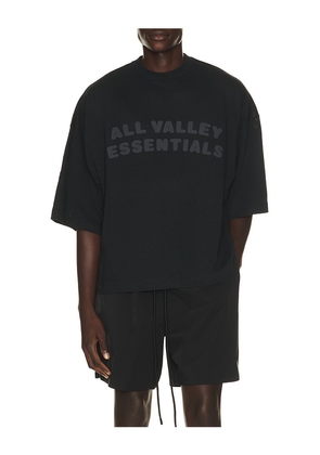 Fear of God ESSENTIALS Merch Tee in Grey. Size XS. Also in S, M, L, XL/1X, XXL/2X, XXXL/3X.