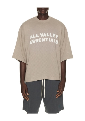 Fear of God ESSENTIALS Merch Tee in Grey. Size XS. Also in S, M, L, XL/1X, XXL/2X, XXXL/3X.