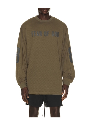 Fear of God ESSENTIALS Merch Long Sleeve Tee in Green. Size XS. Also in S, M, L, XL/1X, XXL/2X, XXXL/3X.