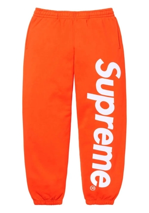 Supreme satin-appliqué cotton track pants - Orange