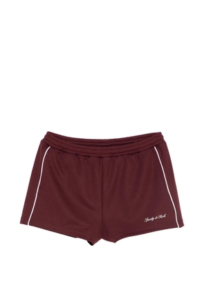 Sporty & Rich logo-embroidered track shorts