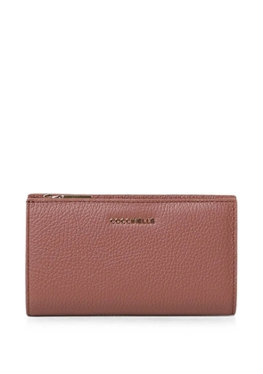 Coccinelle medium Metallic logo-plaque wallet - Pink