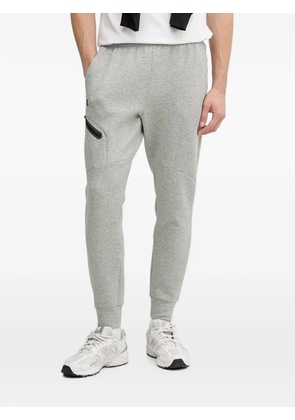 Under Armour Unstoppable logo-print track pants - Grey