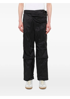 Juun.J belt-bag-detail panelled trousers - Black