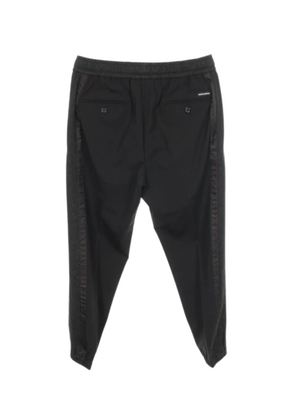 Dolce & Gabbana Pre-Owned 2010s tapered trousers - Black