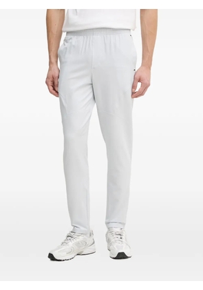 Under Armour UA Unstoppable logo-patch elasticated-waistband trousers - Grey