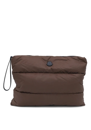 Moncler quilted logo-patch clutch bag - Brown