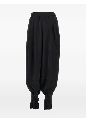 THE ANDAMANE pleated ankle-tie trousers - Black