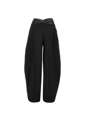 THE ANDAMANE pinstripe-pattern crossover-waistband trousers - Black