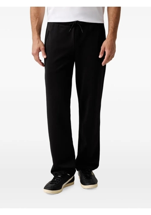 Ea7 Emporio Armani logo-plaque track pants - Black