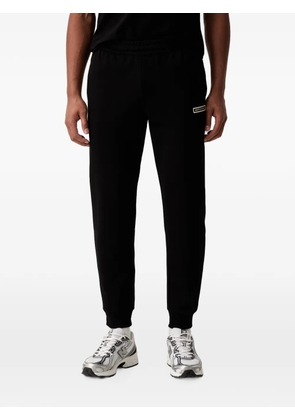 Ea7 Emporio Armani logo-patch track pants - Black